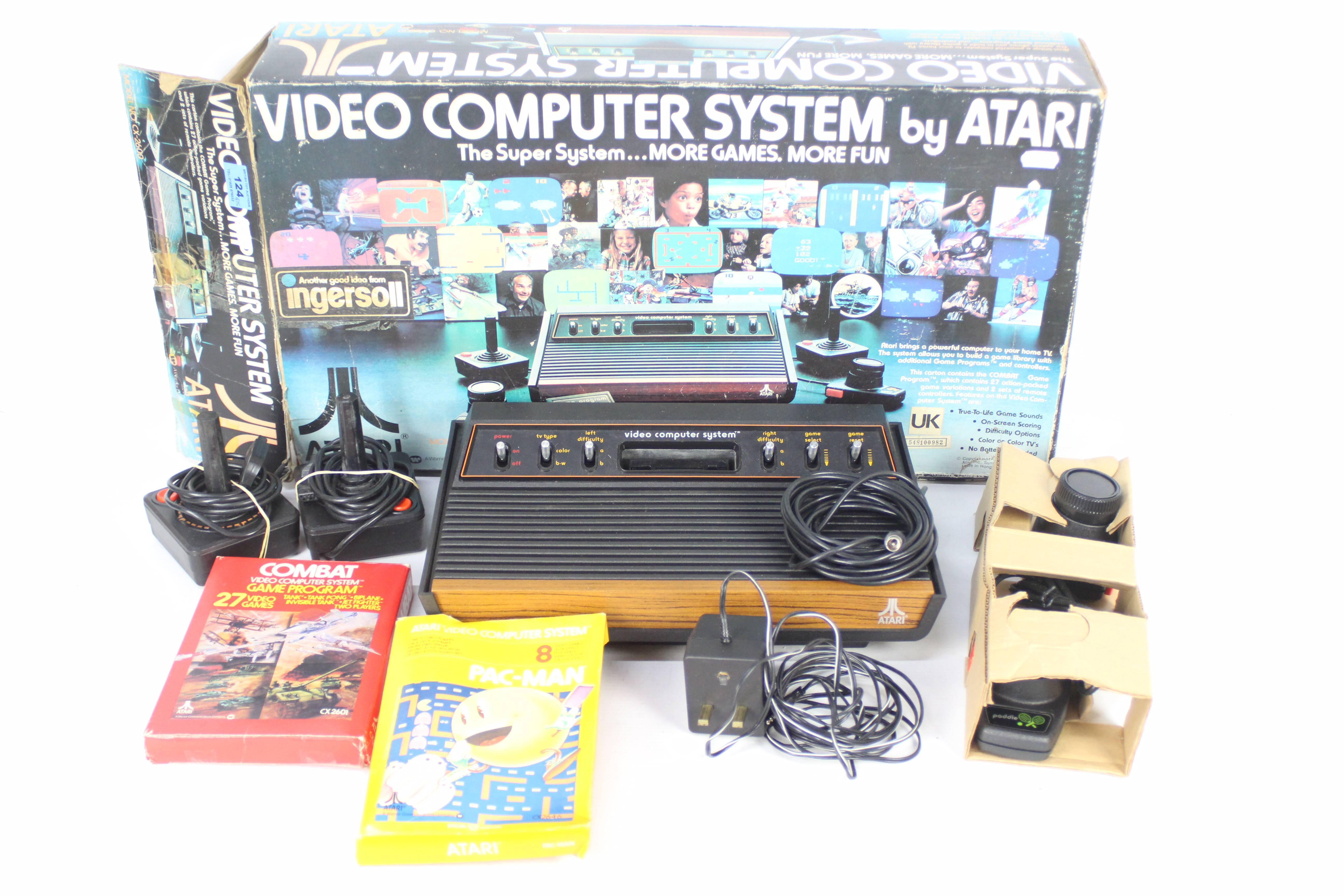 Atari - A boxed vintage Atari CX-2600 U Woodgrain computer system with its power lead and two