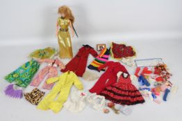 Palitoy - Action Girl - A vintage Action Girl doll with clothing and accessories.