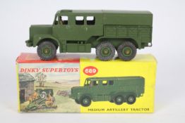 Dinky - A boxed Dinky Medium Artillery Tractor # 689.