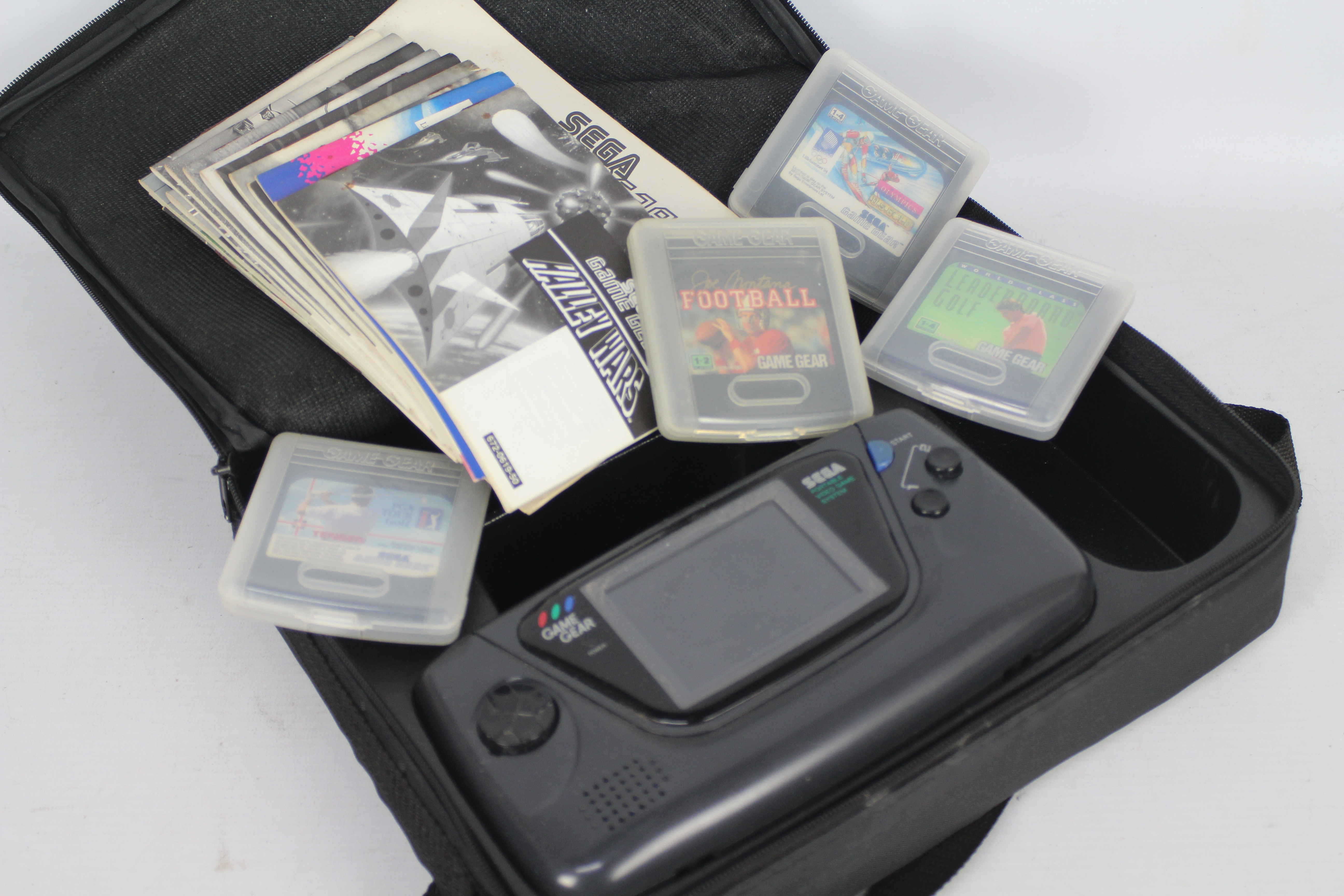 Sega - Spears Games - A vintage Sega Game Gear system with 4 x games in a fitted case and a boxed - Image 2 of 3