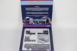 Corgi - A boxed Corgi 'Hauliers of Renown' Limited Edition CC99174 'The WH Malcolm Group'.