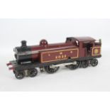 Hornby - A pre war clockwork O Gauge 4-4-4 tank engine number 2052 in LMS maroon livery.