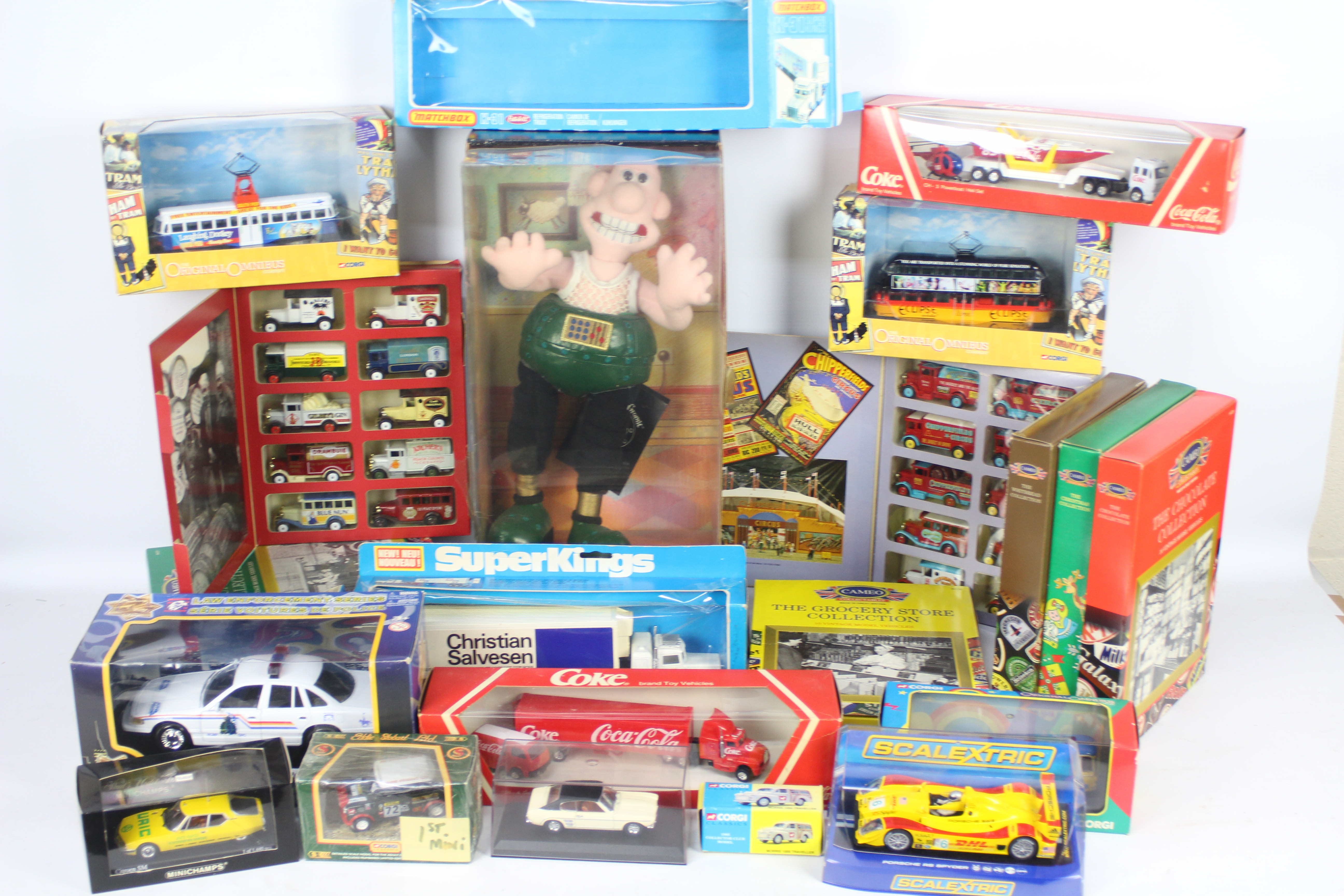 Scalextric, Corgi, Edocar, Matchbox, Others - A mixed boxed collection of diecast,