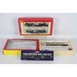 Hornby, Bachmann - Three boxed items of OO gauge passenger and freight rolling stock.