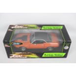 Racing Champions / Ertl - A boxed 1:18 scale 'Fast & Furious' diecast 1970 Dodge Challenger.