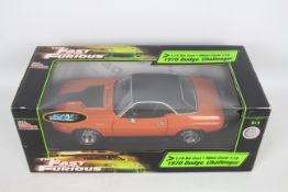 Racing Champions / Ertl - A boxed 1:18 scale 'Fast & Furious' diecast 1970 Dodge Challenger.