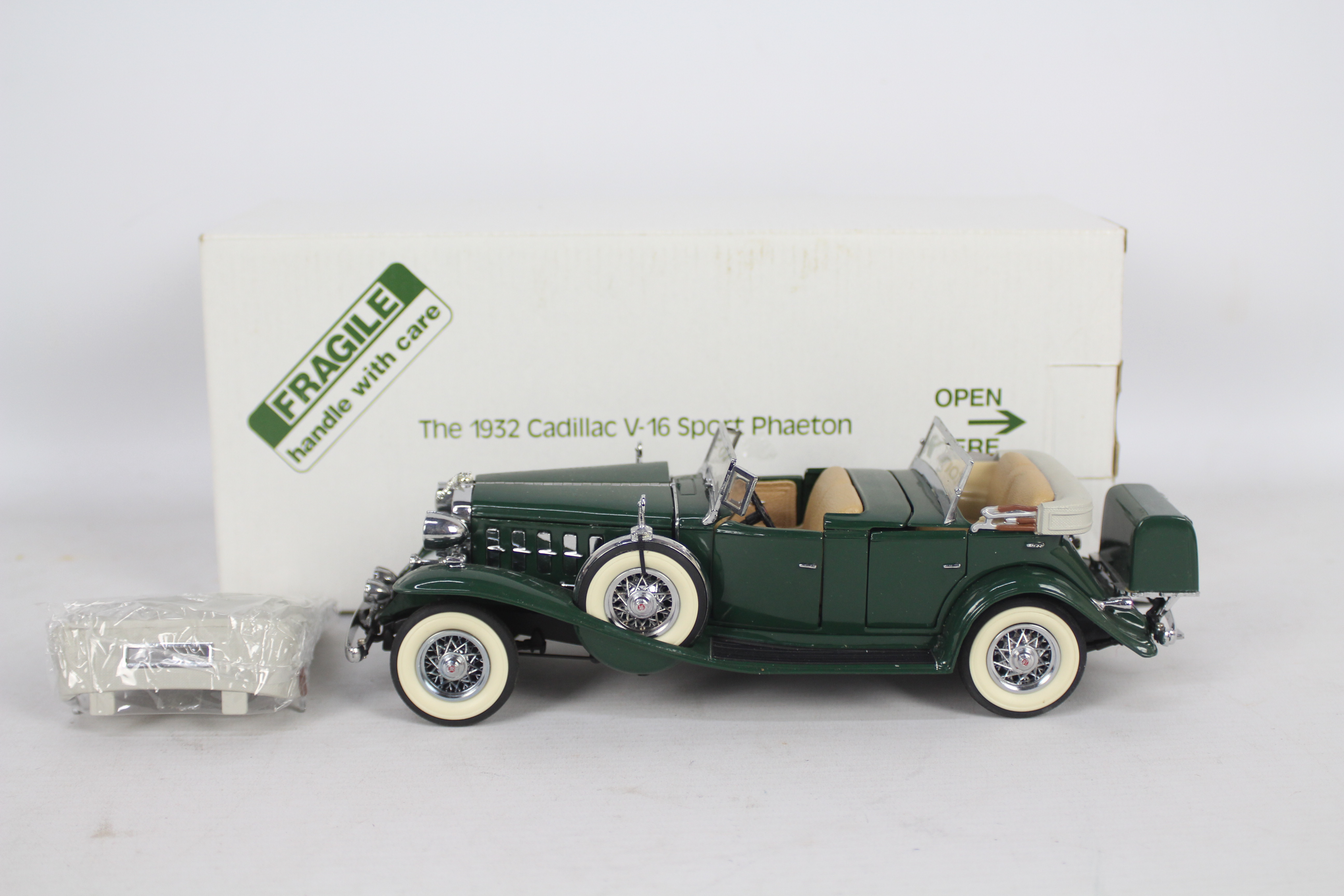 Danbury Mint - A boxed Danbury Mint diecast 1:24 scale 1932 Cadillac V-16 Sport Phaeton..