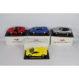 Maisto - Four boxed 1:18 scale diecast model cars from Maisto.
