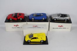 Maisto - Four boxed 1:18 scale diecast model cars from Maisto.