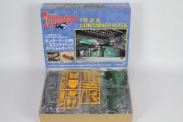 Aoshima - Carlton - Happinet - A boxed Thunderbird 2 & Container Dock model kit in 1:350 scale.