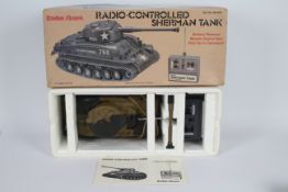 Radio Shack - A boxed vintage Radio Shack #60-3037 Radio Controlled Sherman Tank.