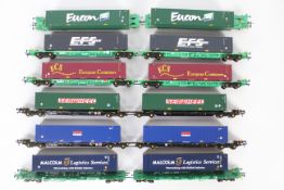Bachmann - A rake of 6 unboxed pairs of Bachmann Intermodal Flat wagons with Containers.