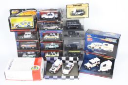 Corgi, Oxford Diecast - A collection of boxed diecast police vehicles in 1:43 scale.