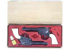 BCM - Cap Guns - A boxed 'Outlaw Kid' Presentation Set of Repeating Cap Guns.
