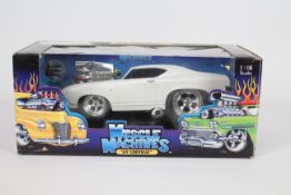 The Original Muscle Machines - A 1:18 scale silver-coloured 'SS 396' 69 Chevelle.