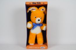 Telitoy - A boxed orange-coloured 'Baby Pride' soft toy rabbit.