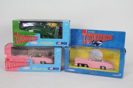 Corgi - Three boxed 'Thunderbirds' related diecast model vehicles from Corgi.