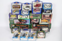 Corgi, Oxford Diecast, Cararama, Other - Over 20 boxed diecast model vehicles in various scales.