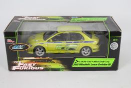 Racing Champions - Ertl - A boxed The Fast And The Furious Mitsubishi Lancer Evolution VII. # 33448.