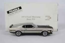 Danbury Mint - A boxed 1:24 scale diecast 1971 Ford Mustang Boss 351 by Danbury Mint.