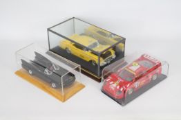 Johnny Lightning, Mira, Bburago - Three unboxed 1:18 scale diecast models.