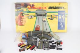 Matchbox - Corgi - A boxed Matchbox Motorway # No12 and an unboxed Matchbox Roadset with 16 x cars.