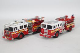 Code 3 Collectibles - 2 x unboxed Seagrave 1000 gpm Pumper models in FDNY livery in 1:76 scale,