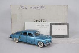 Franklin Mint - A boxed 1948 Tucker in 1:24 scale # B11ST35.