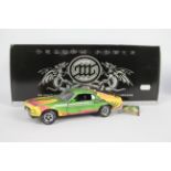 Franklin Mint - A boxed Ford Mustang Boss 302 finished in a special Michael Whelan Dragon Power