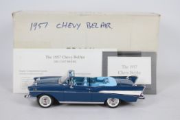 Franklin Mint - A boxed 1:24 scale 1957 Chevy Bel-Air by Franklin Mint.