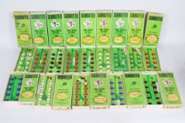 Subbuteo - 14 x boxed teams including Celtic, Motherwell, Manchester City and more.