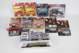 Jada - Cararama - Johnny Lightning - 14 x carded / boxed models in various scales including Nissan