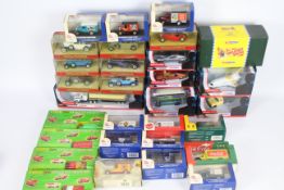 Corgi, Matchbox, Lledo - A collection of over 20 boxed diecast vehicles in various scales.