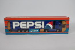 Tekno - A boxed Tekno #48 'The British Collection' 1:50 scale diecast ERF Curtainside 'Pepsi'.