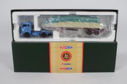 Corgi - A boxed limited edition Volvo F88 sheeted flatbed trailer in BRS Midland livery. # CC13105.