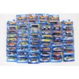Hot Wheels - 50 x unopened carded vehicles from 2006/7 including Ford GT-40 # J3423,