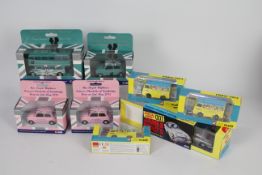 Corgi - A boxed collection of eight Commemorative diecast models from Corgi.