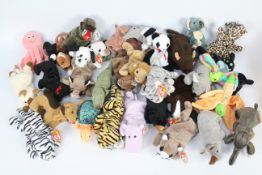 Ty Beanies - A quantity of 30 x Ty Beanie Babies - Lot includes a 'Happy' Beanie Baby hippo,