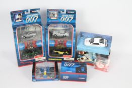 Corgi - Four boxed 'James Bond' themed diecast model vehicles / sets.