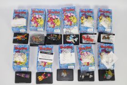 Konami - A collection of 11 boxed Konami 'Wacky Races' themed 'Candy Toys'.