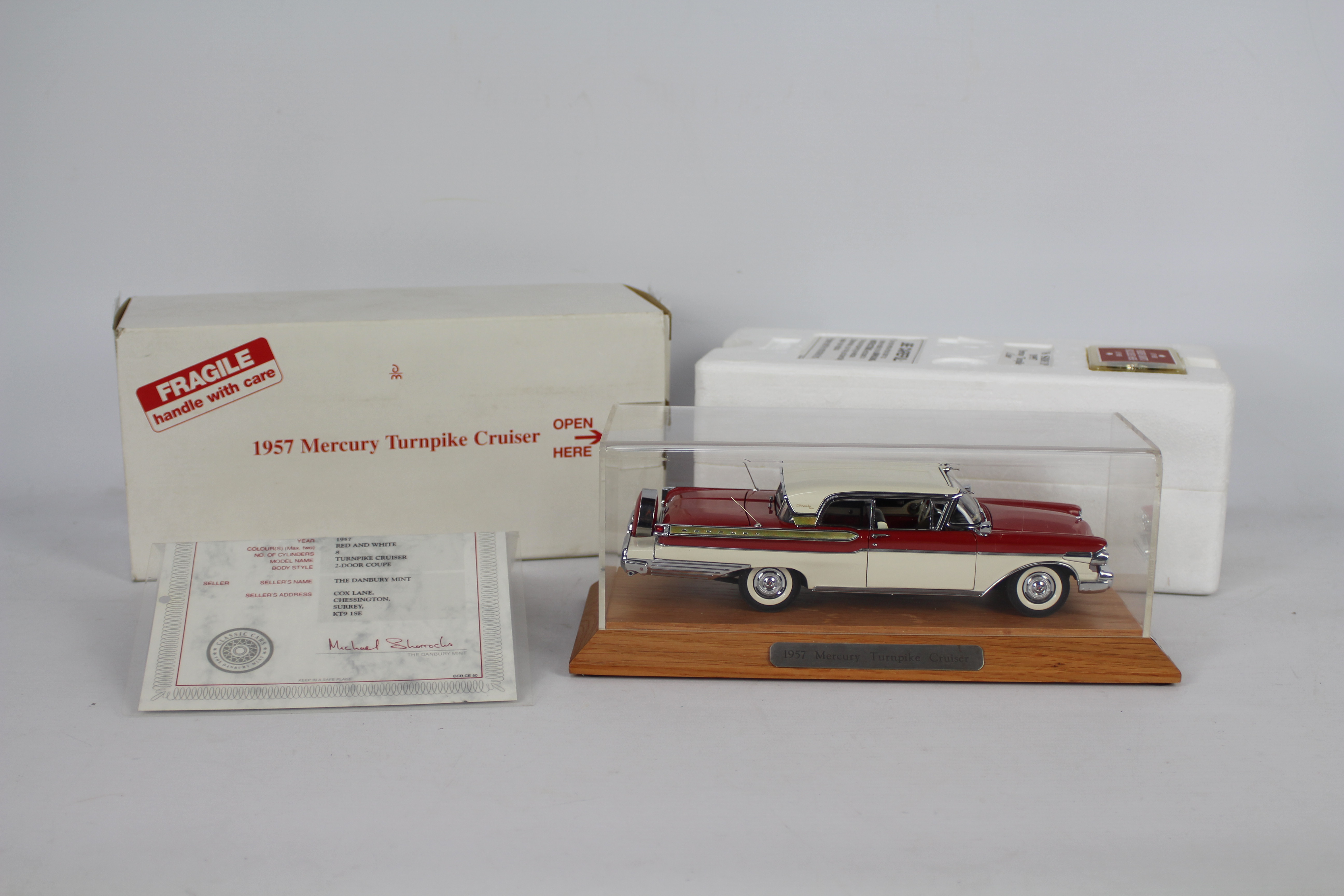 Danbury Mint - A boxed 1:24 scale 1957 Mercury Turnpike Cruiser by Danbury Mint.