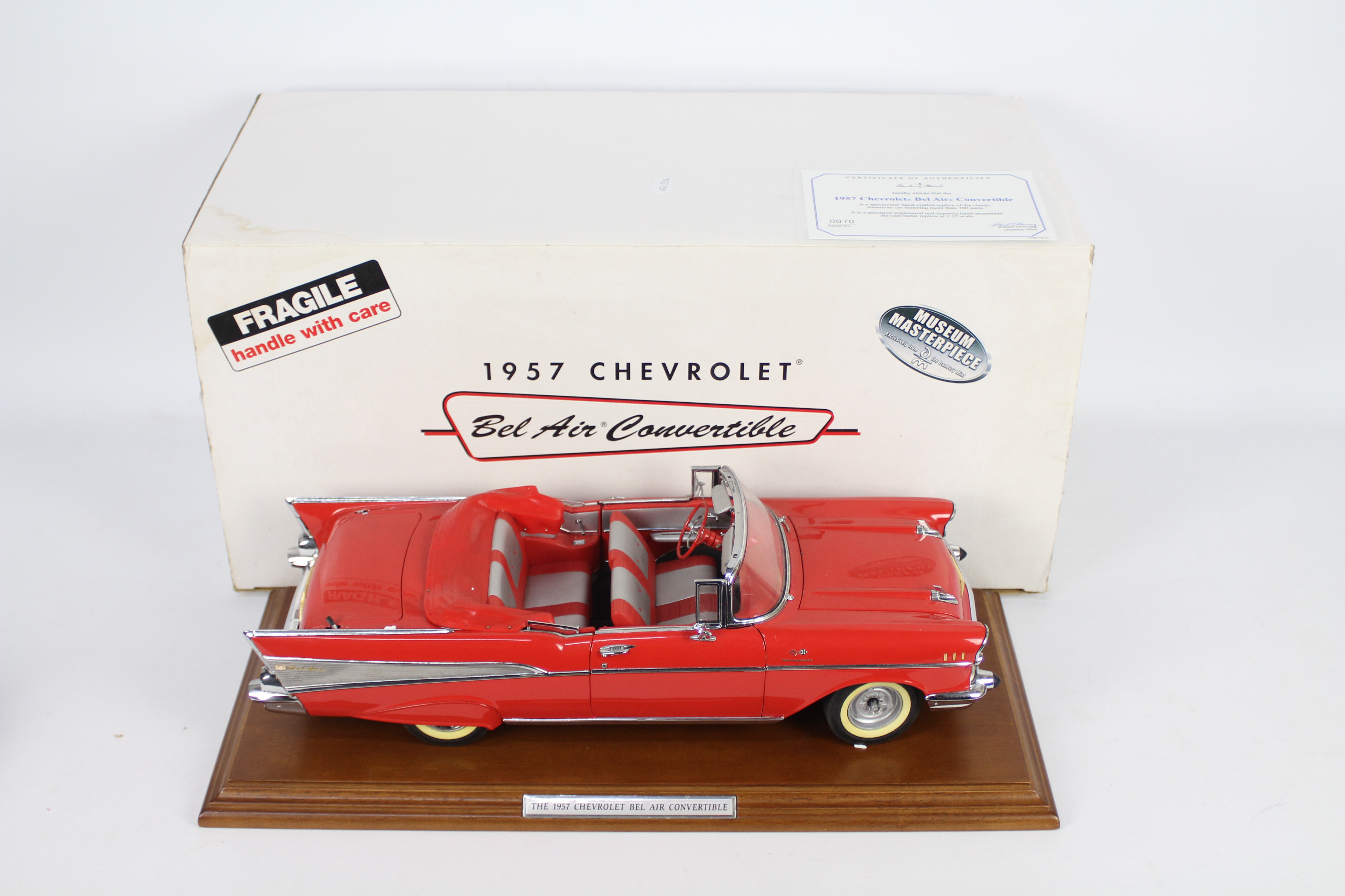 Danbury Mint - A boxed 1:12 scale 1957 Chevrolet Bel Air Convertible by Danbury Mint.