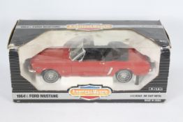 Ertl - A boxed Ertl 'American Muscle' 1:12 scale diecast #8776 1964½ Ford Mustang.
