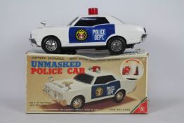 Yonezawa - A boxed vintage Yonezawa #14045 battery operated 'Unmasked Police Car'.