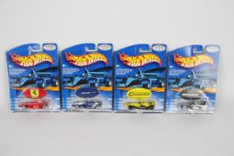 Hot Wheels - Grand Prix - 4 x unopened carded models from the 2000 Grand Prix range including