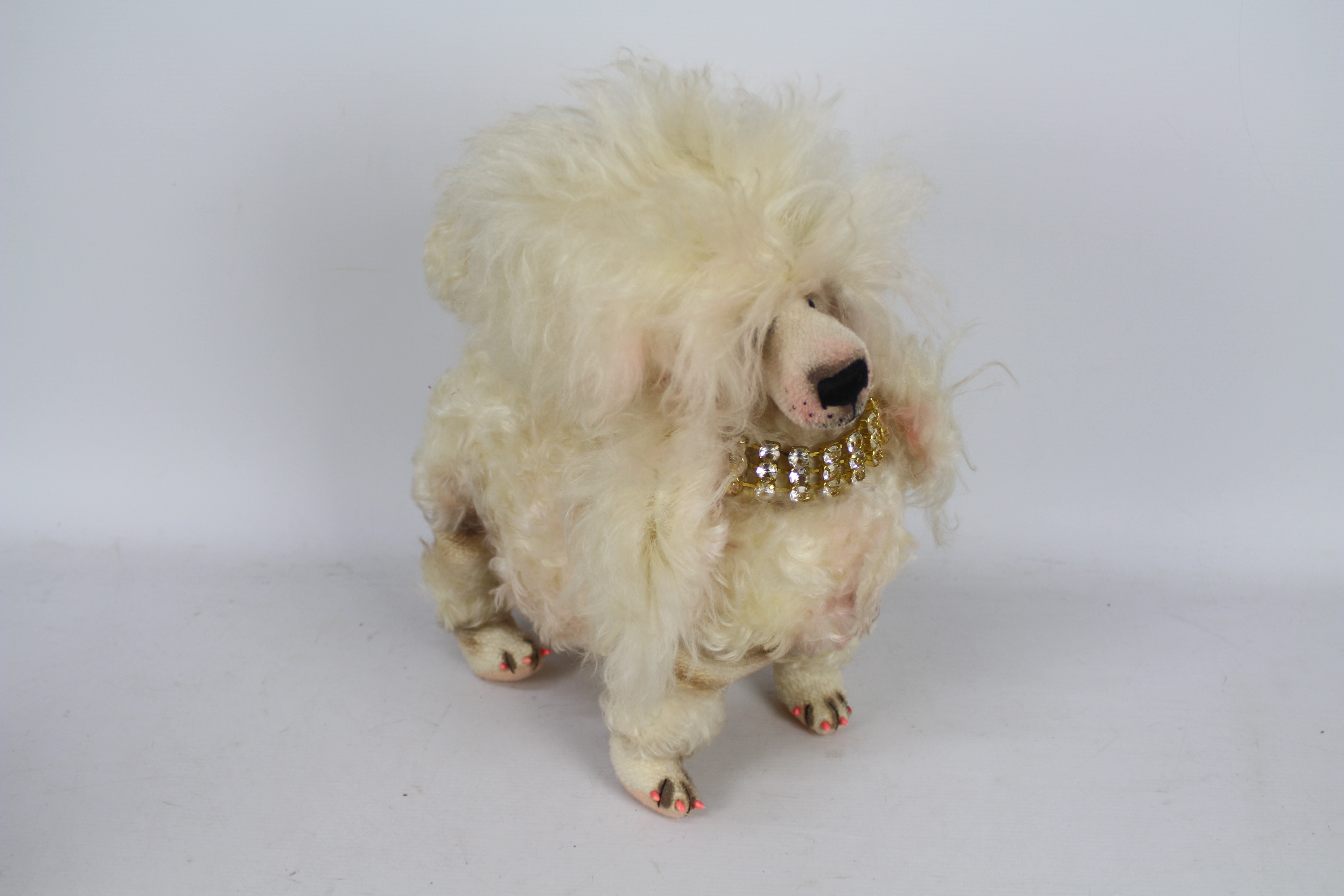 Susan Tautlinger - A mohair miniature Poodle with jointed head made by Susan Tautlinger.