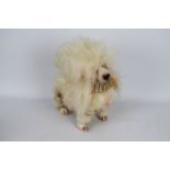 Susan Tautlinger - A mohair miniature Poodle with jointed head made by Susan Tautlinger.