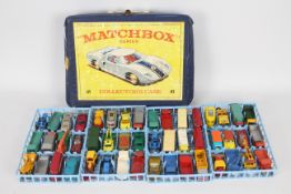 Matchbox - A Matchbox 48 case 1968 dark blue vinyl carry case with white handle contain 4 internal