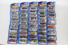 Hot Wheels - 50 x unopened carded models from circa year 2000 including Chevrolet Camaro Z-28 #