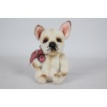 Unknown Maker - A French Bull Dog with glass eyes, plastic nose, and pink ears.